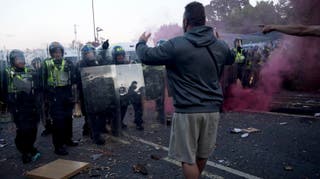 Missiles such as bricks and bottles were thrown at officers